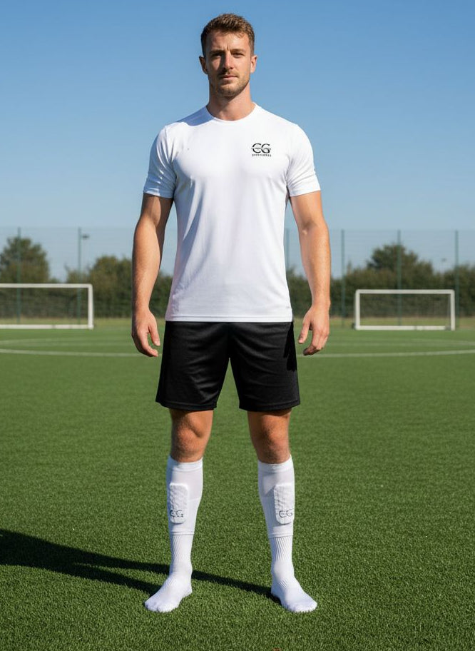 football player wearing shin pad sleeves